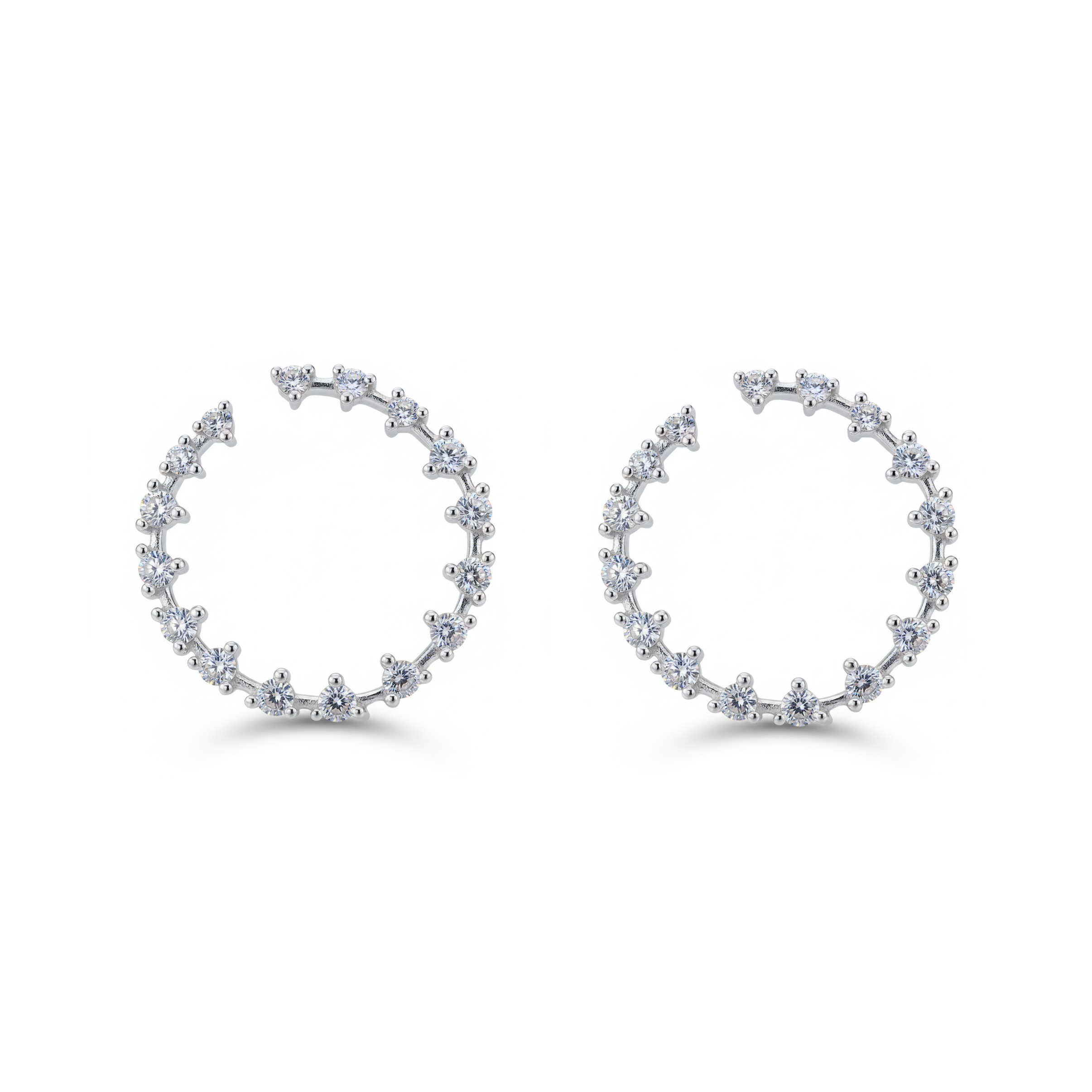 Pair of silver hoop earrings with small diamonds on a white background